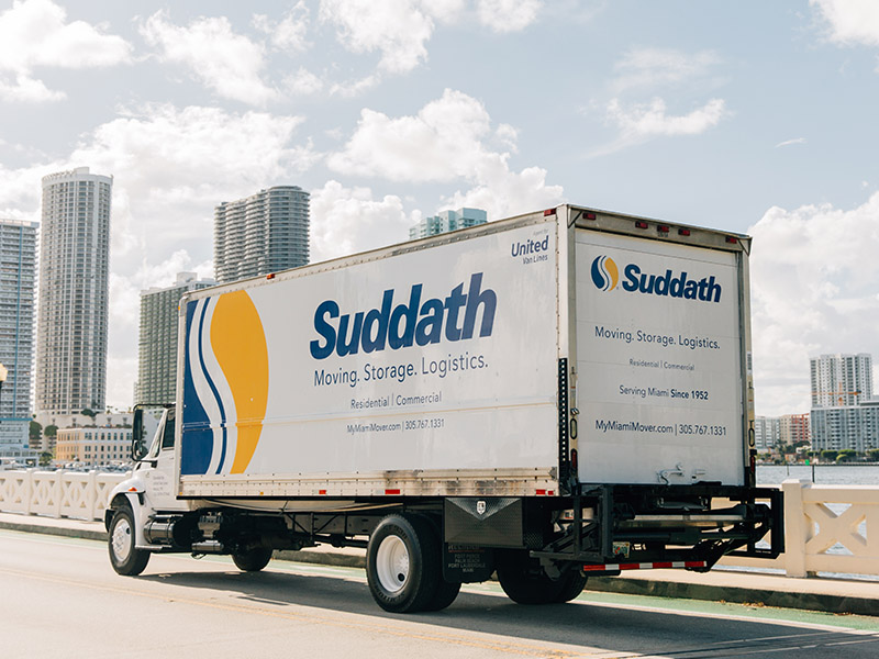 suddath moving truck driving in miami florida